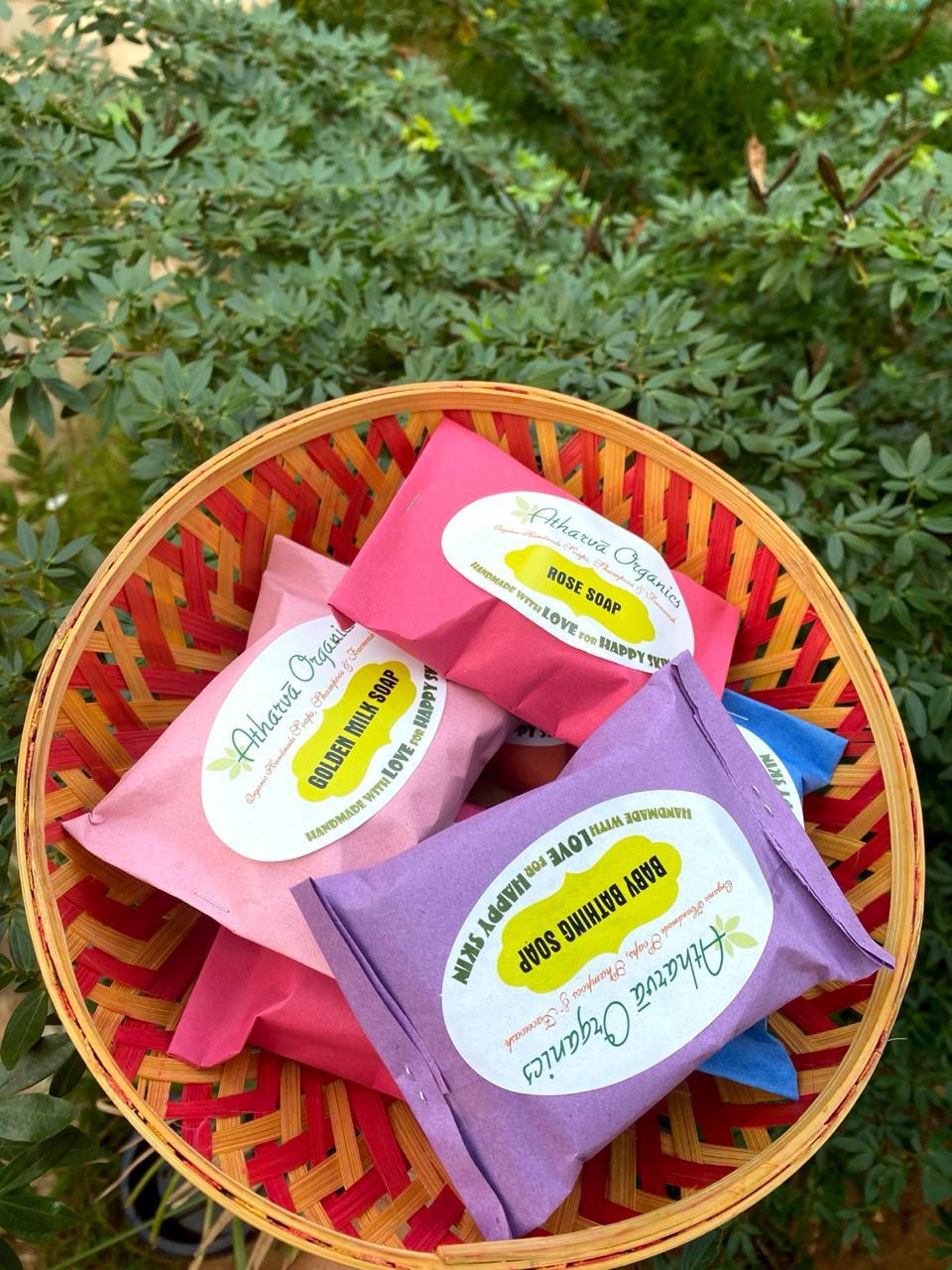Atharva gift hamper with soaps, shampoos, and face wash in a stylish basket