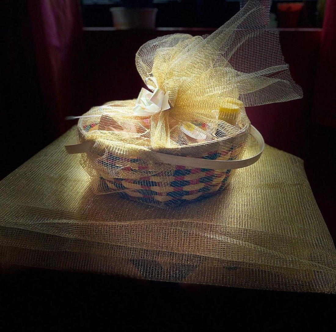 Atharva gift hamper with soaps, shampoos, and face wash in a stylish basket